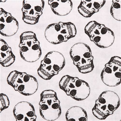off-white tossed skulls skull fabric by Timeless Treasures - modeS4u