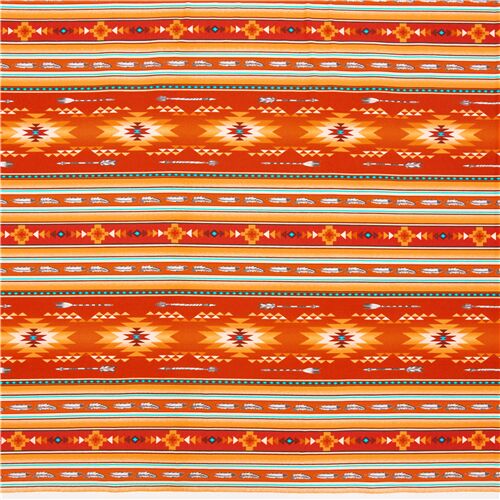 orange and brown striped cotton fabric with arrows and feathers blocky