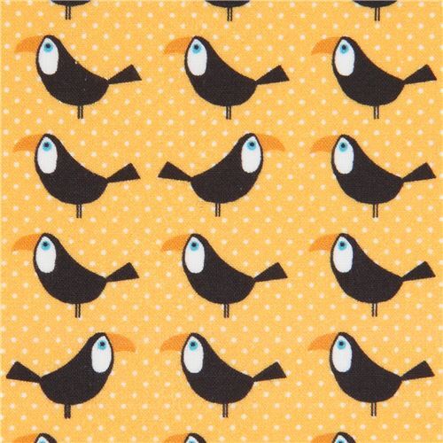 Tissu Stof France orange avec des toucans Tissu
