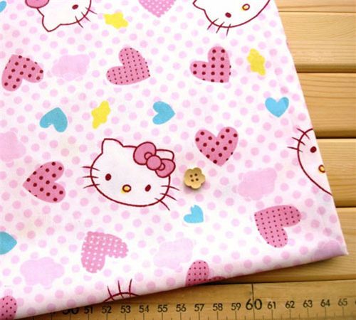 pink kawaii fabric with Hello Kitty heads half yard 1