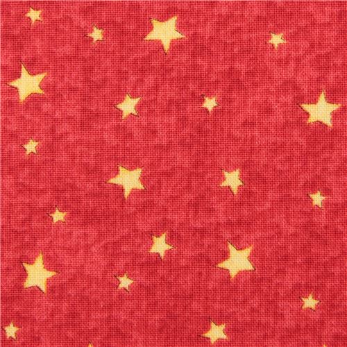red fabric with small yellow star Quilting Treasures 1