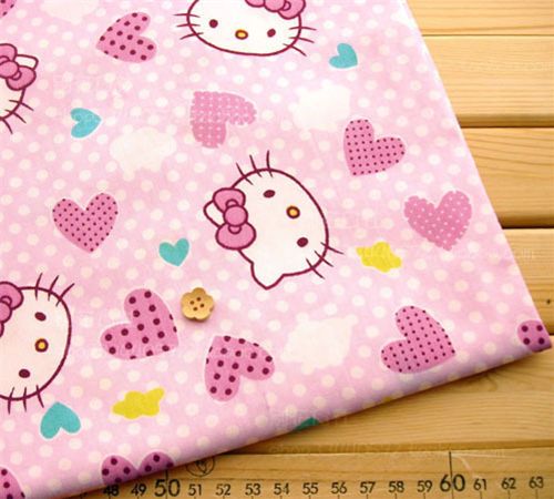 rose kawaii fabric with Hello Kitty heads half yard 1