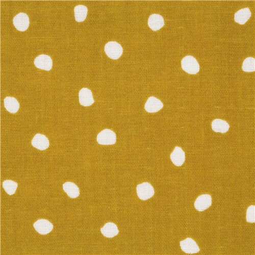 brown with white polka dot fabric