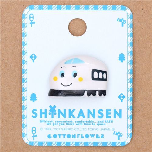 Bouton avec un train aux roues et fentres noires par Sanrio, lunit