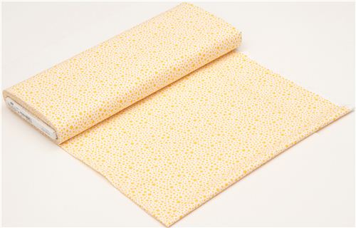 white Michael Miller fabric with many yellow stars 3