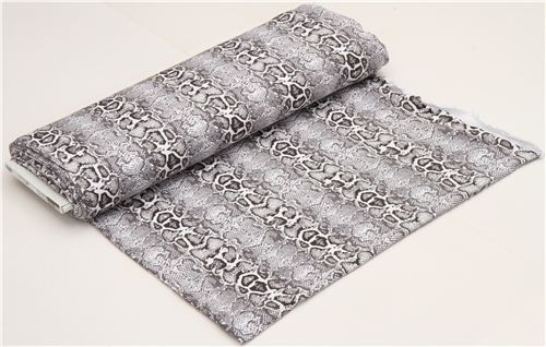 white Robert Kaufman knit fabric with snake print 3
