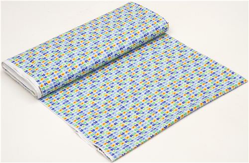 white designer fabric with small colourful elephants 3