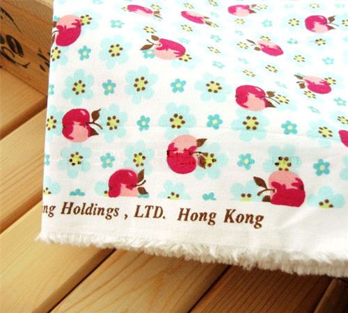 white fabric with apples and flowers 0.5m 1