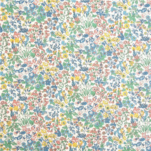 white fabric with pink green blue yellow florals foliage by Liberty ...