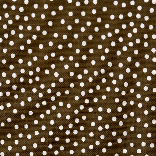 brown with white polka dot fabric