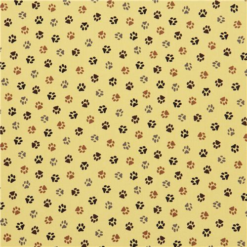 yellow dogs paws fabric by Robert Kaufman 2