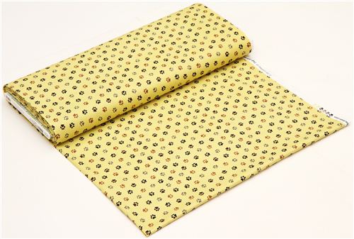 yellow dogs paws fabric by Robert Kaufman 3